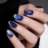 24Pcs Blue Cat Eye Press on Nails with Light Bulbs Design